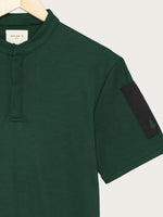 détail polo Simba vert sapin piqué à plat