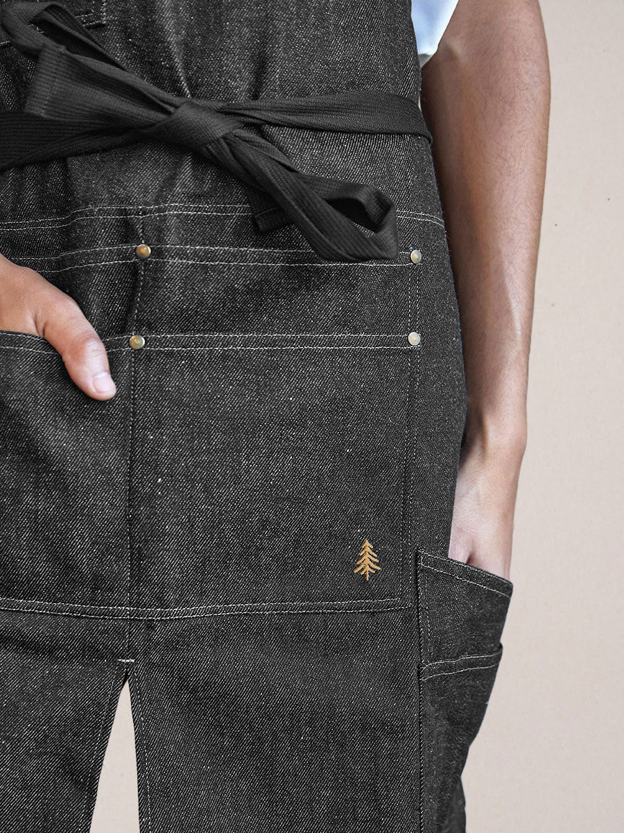 détail poches basses tablier Cumbia denim