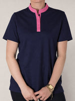 polo simba octobre rose portée par une femme